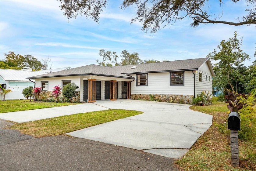 Welcome to this beautifully updated 3-bedroom, 2.5-bath, 2-car - Beach Home for sale in Seminole, Florida on Beachhouse.com