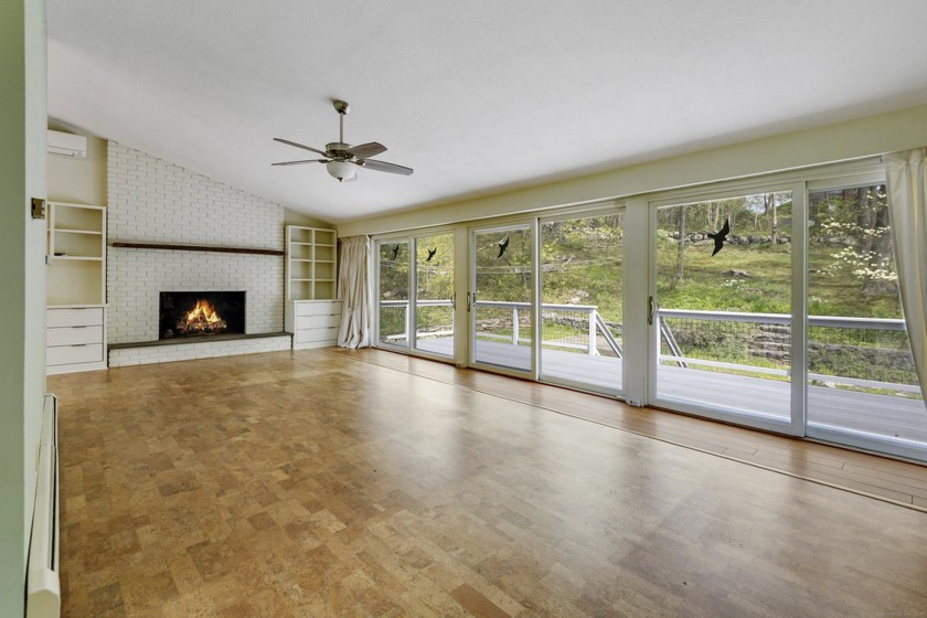 A drive-by will not do this property justice! This Sachems Head - Beach Home for sale in Guilford, Connecticut on Beachhouse.com