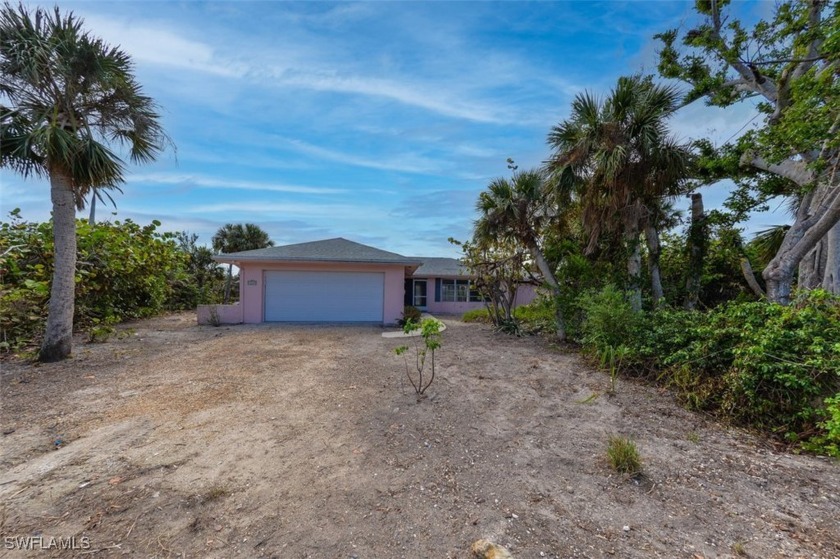 Panoramic water views form this spectacular lot in the - Beach Home for sale in Sanibel, Florida on Beachhouse.com