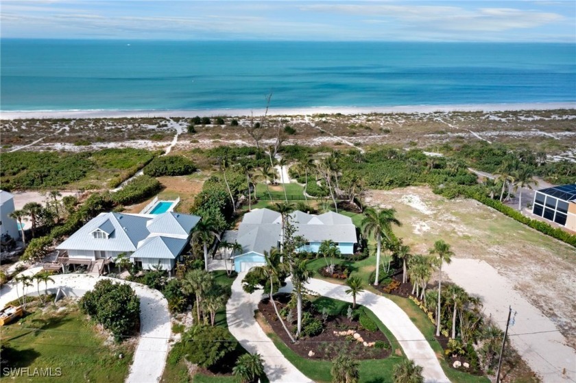 GULF FRONTAGE! This coastal oasis with a mid-century modern feel - Beach Home for sale in Sanibel, Florida on Beachhouse.com