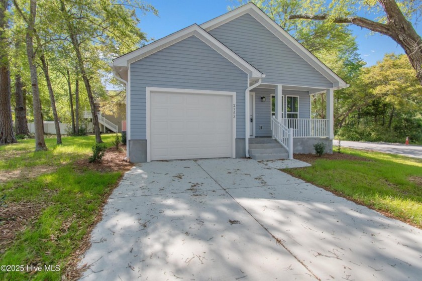 This BRAND NEW ICW view home is being offered at $394,900 to - Beach Home for sale in Supply, North Carolina on Beachhouse.com