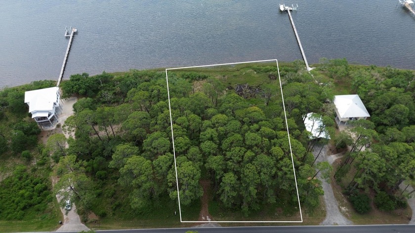 Discover your slice of paradise with this spacious 1.2-acre - Beach Lot for sale in Lanark Village, Florida on Beachhouse.com