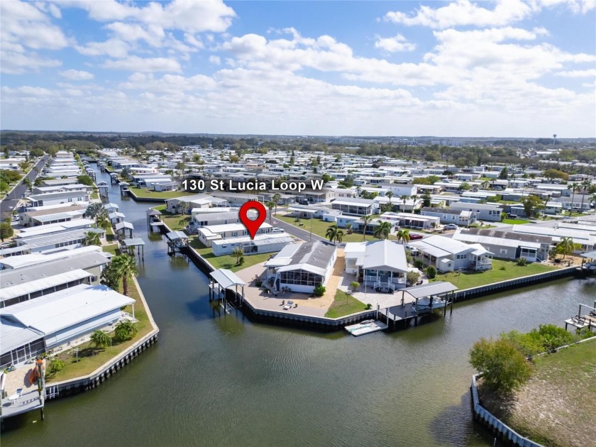 A KEY WATERFRONT LOT ON THE CANAL, in 55+ Caribbean Isles - Beach Home for sale in Apollo Beach, Florida on Beachhouse.com
