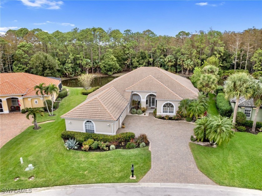 This stunning home offers RARE private lake and preserve views - Beach Home for sale in Fort Myers, Florida on Beachhouse.com