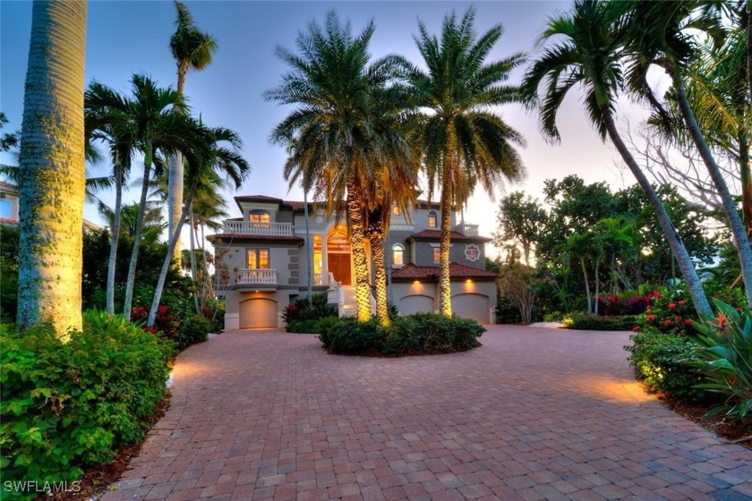 Perfectly situated on exclusive west gulf drive and set directly - Beach Home for sale in Sanibel, Florida on Beachhouse.com