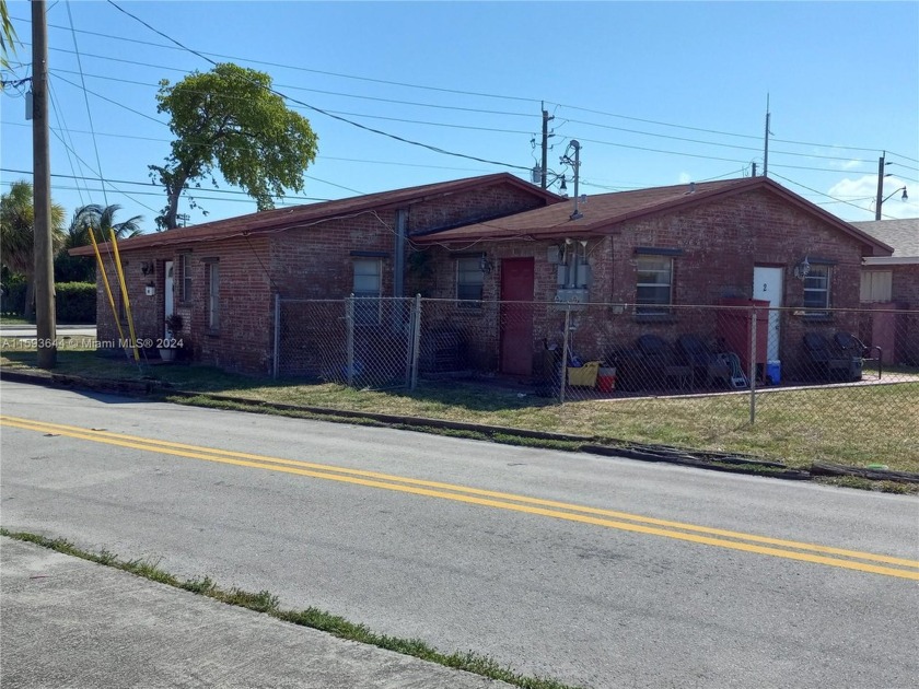 JUST REDUCED BY $65K! Sturdy well maintained 2 BR 1 BA duplex in - Beach Townhome/Townhouse for sale in Hallandale Beach, Florida on Beachhouse.com