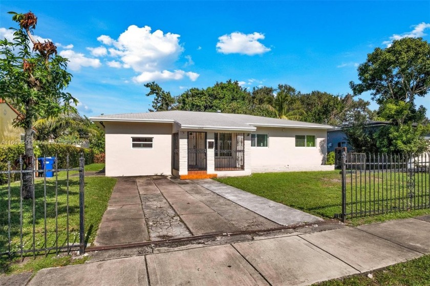 This charming single-family home in North Miami Beach features 3 - Beach Home for sale in North Miami Beach, Florida on Beachhouse.com