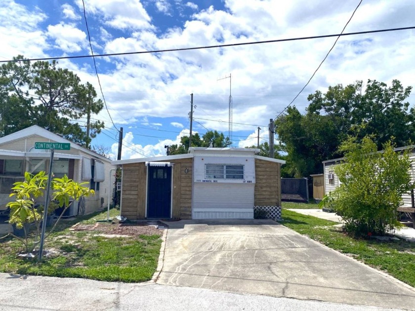 This Charming 2 Bedroom, 1 Bath Partially Furnished Home is in - Beach Home for sale in Holiday, Florida on Beachhouse.com