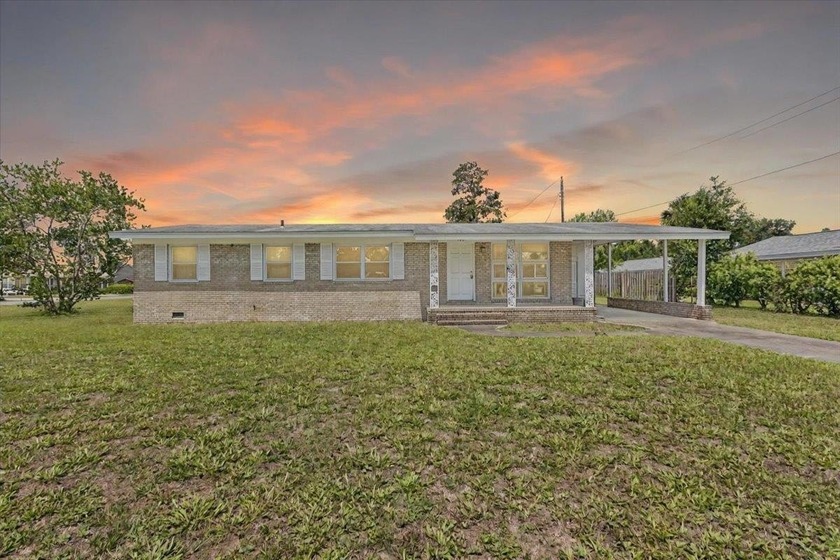 Charming all-brick 3 bedroom, 2 bath home situated on a spacious - Beach Home for sale in Perry, Florida on Beachhouse.com