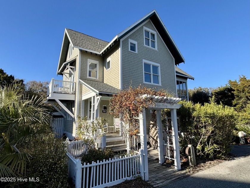 This exquisite high-dunes cottage exudes coastal charm with - Beach Home for sale in Southport, North Carolina on Beachhouse.com