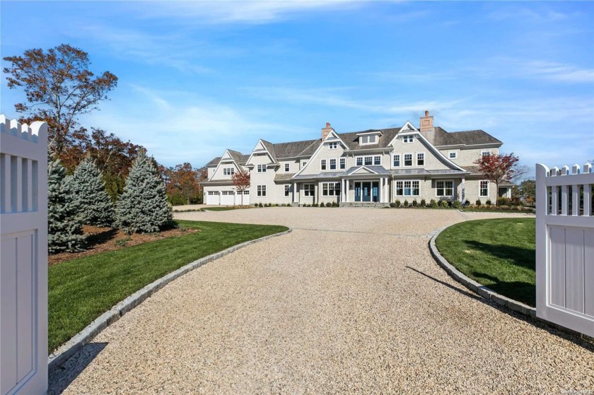 This stunning waterfront home in Quogue offers direct access to - Beach Home for sale in Southampton, New York on Beachhouse.com