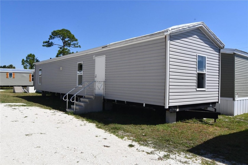 BUYER IS RESPONSIBLE FOR DELIVERY OF THE MOBILE HOME TO THE LOT - Beach Home for sale in Punta Gorda, Florida on Beachhouse.com