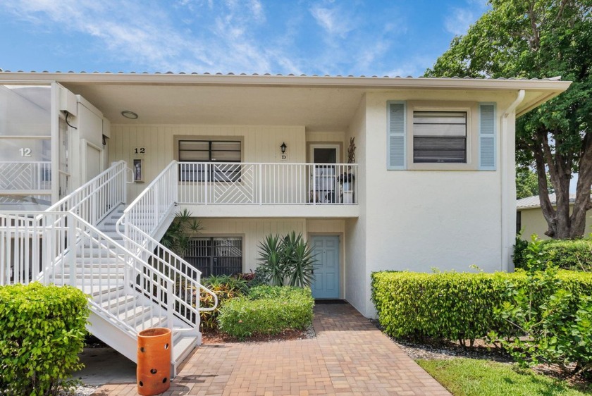Enjoy serene water views from this light and bright first-floor - Beach Condo for sale in Boynton Beach, Florida on Beachhouse.com