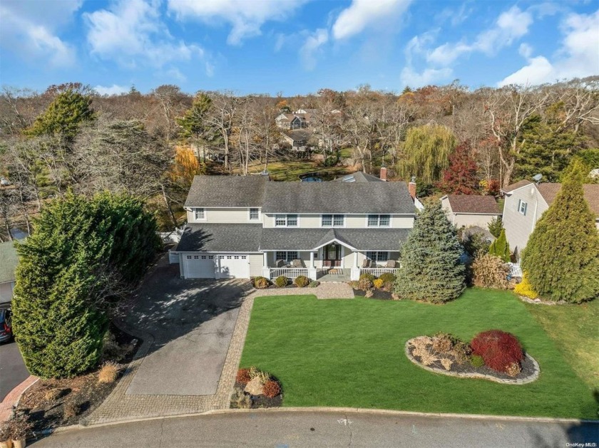 Stunning Center-Hall Colonial in Magoun Landing.  Discover this - Beach Home for sale in Islip, New York on Beachhouse.com