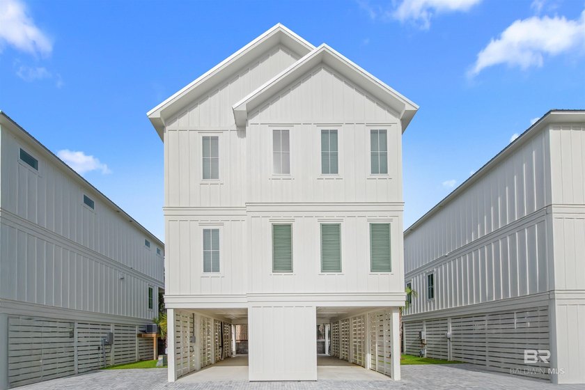 Welcome to a prestigious waterfront retreat where elegance meets - Beach Home for sale in Orange Beach, Alabama on Beachhouse.com