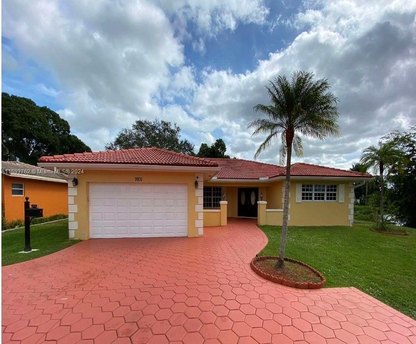 Discover the charm of lakeside living with 3-bedroom, 2-bathroom - Beach Home for sale in Coral Springs, Florida on Beachhouse.com