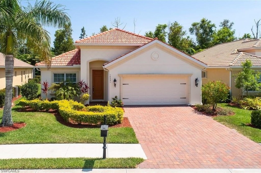 Built in 2017, this Freshwater II floor plan home is brimming - Beach Home for sale in Naples, Florida on Beachhouse.com