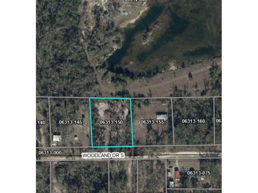 Discover your perfect getaway on this high and dry .97 acres - Beach Lot for sale in Perry, Florida on Beachhouse.com