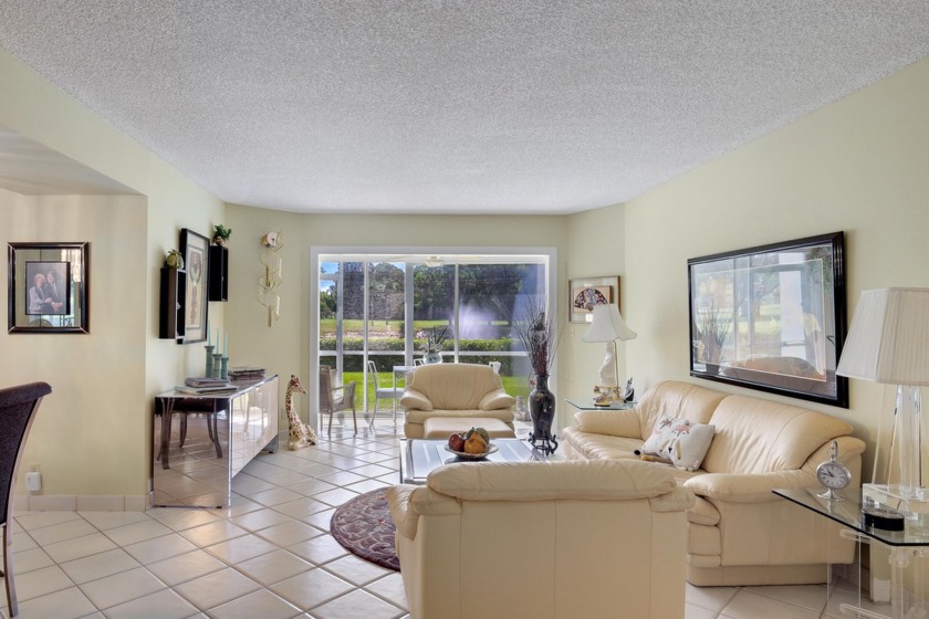 WELCOME TO THIS CONVENIENT 1ST FLOOR CONDO WITH BEAUTIFUL WATER - Beach Condo for sale in Lake Worth, Florida on Beachhouse.com