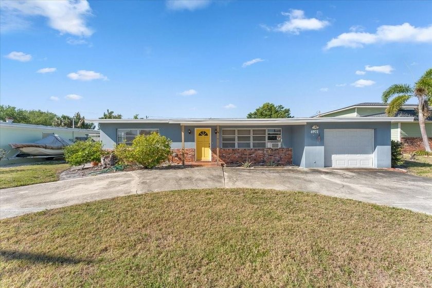 Located in the highly sought-after waterfront community of - Beach Home for sale in St. Petersburg, Florida on Beachhouse.com