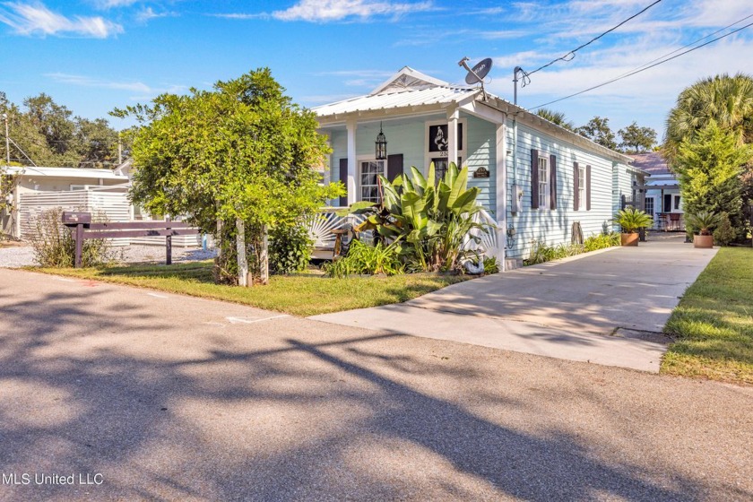 This charming cottage and guest house on the second block of - Beach Home for sale in Bay Saint Louis, Mississippi on Beachhouse.com