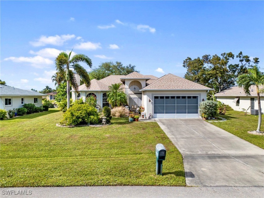 This elegant home on wide open canal with dock and miles of - Beach Home for sale in Cape Coral, Florida on Beachhouse.com