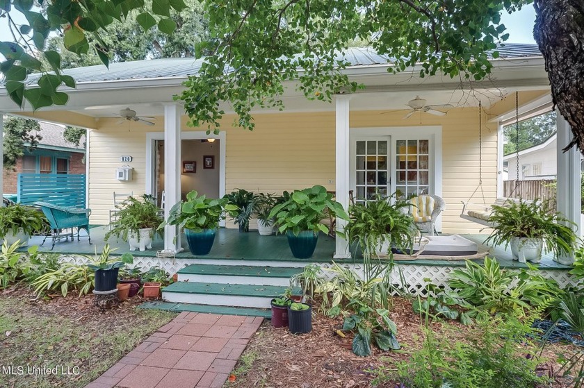 Step into this charming sunshine filled 3 bedroom, 2 bath - Beach Home for sale in Gulfport, Mississippi on Beachhouse.com