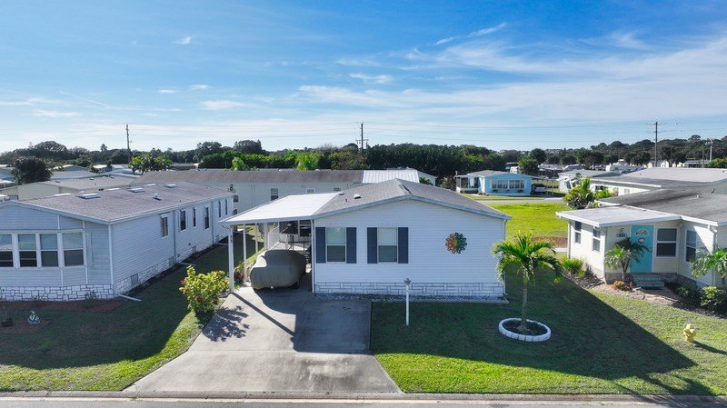 Well-designed 3/2 split bedroom home featuring spacious living - Beach Home for sale in Barefoot Bay, Florida on Beachhouse.com