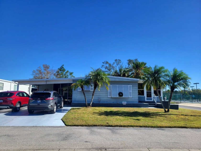 TURNKEY FURNISHED OVERLOOKING LAKE AND JUST STEPS TO AMENITIES! - Beach Home for sale in Sarasota, Florida on Beachhouse.com