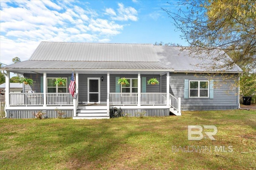 Don't miss this one! Spend your afternoons on the covered front - Beach Home for sale in Robertsdale, Alabama on Beachhouse.com
