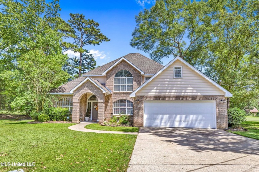 Step into this beautiful home right on the GOLF COURSE with high - Beach Home for sale in Diamondhead, Mississippi on Beachhouse.com