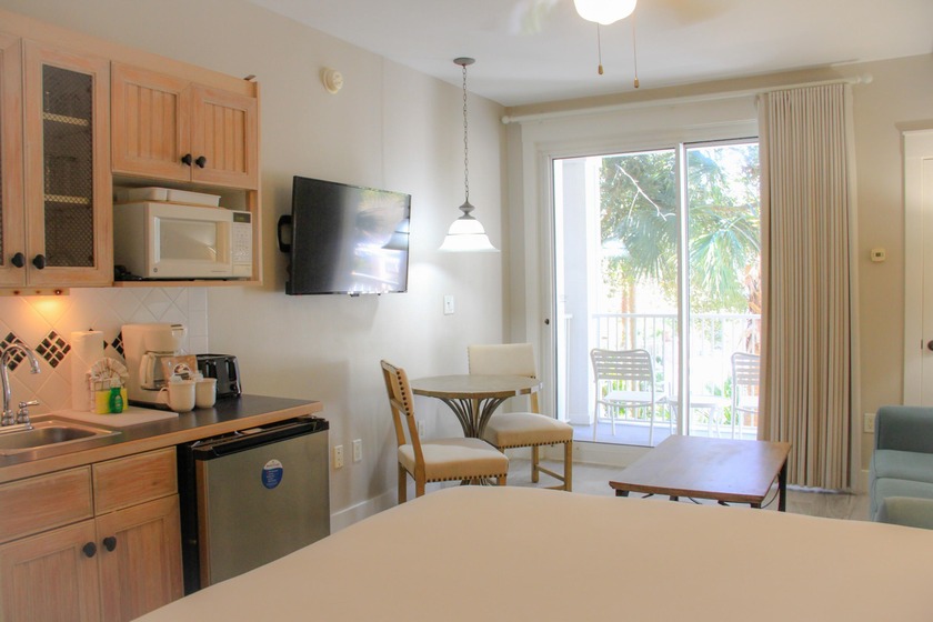 Perched on the 4th floor and overlooking the vibrant amenity - Beach Condo for sale in Miramar Beach, Florida on Beachhouse.com
