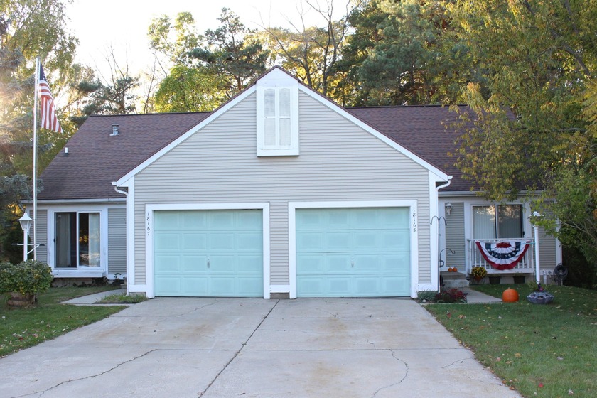 Take advantage of this investment opportunity. Two unit duplex - Beach Lot for sale in Spring Lake, Michigan on Beachhouse.com