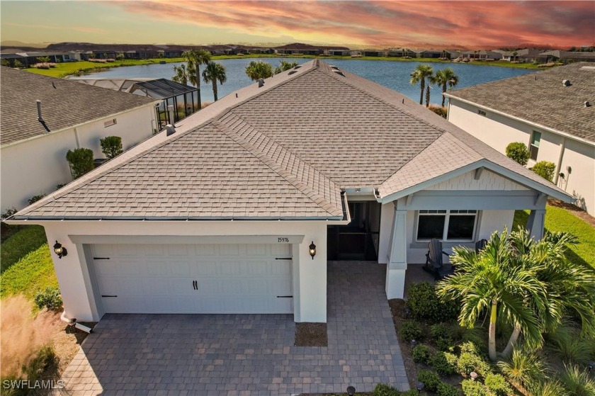 Stunning Custom Lake Home in Edgewater Shores! Welcome to this - Beach Home for sale in Punta Gorda, Florida on Beachhouse.com