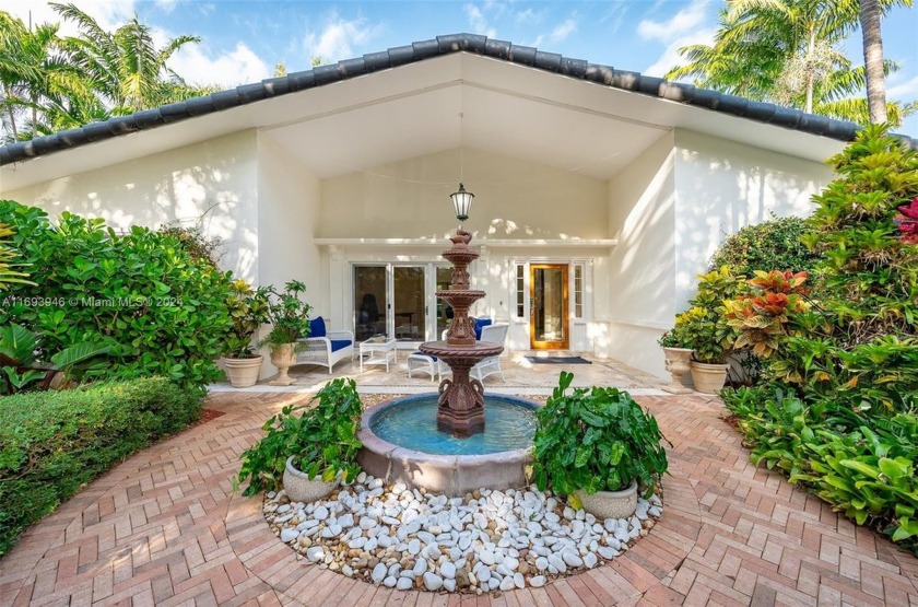 This charming one-story Villa located on one of the islands most - Beach Home for sale in Key Biscayne, Florida on Beachhouse.com