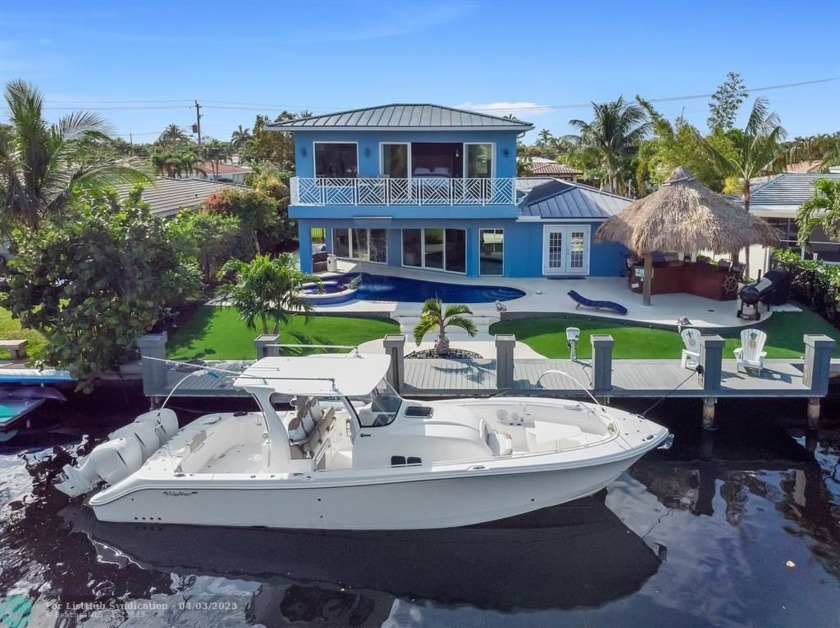 Fabulous  intercostal home! 1 fixed bridge. Glass tile pool with - Beach Home for sale in Pompano Beach, Florida on Beachhouse.com