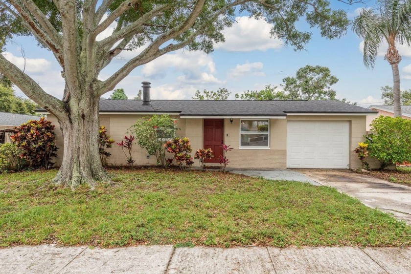 Welcome to this beautifully maintained and truly move-in ready - Beach Home for sale in Largo, Florida on Beachhouse.com