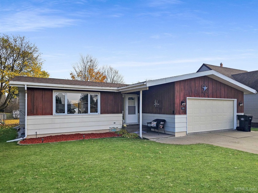 Welcome to this 3-bedroom, 3-bathroom home offers a thoughtfully - Beach Home for sale in Escanaba, Michigan on Beachhouse.com