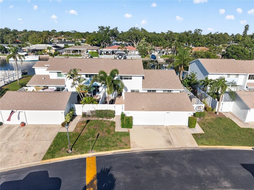 Rare waterfront find! This impeccably upgraded 3-bedroom - Beach Townhome/Townhouse for sale in St. Petersburg, Florida on Beachhouse.com