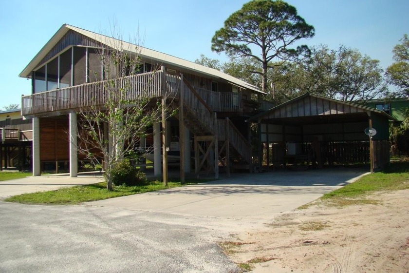 Discover this cozy 2-bedroom, 2-bathroom home in the heart of a - Beach Home for sale in Horseshoe Beach, Florida on Beachhouse.com