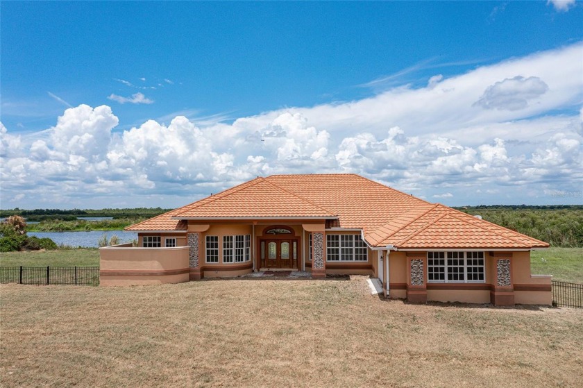 IDYLLIC COUNTRY ESTATE ON BANKS OF SHELL CREEK RESERVOIR - - Beach Home for sale in Punta Gorda, Florida on Beachhouse.com