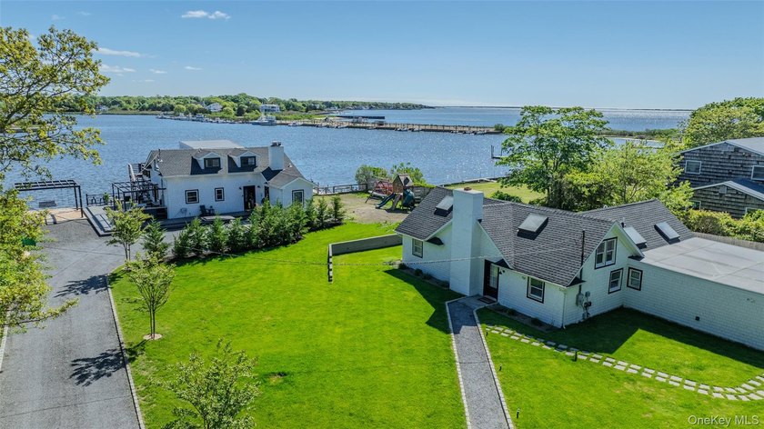 Experience the ultimate in coastal living with this - Beach Home for sale in Center Moriches, New York on Beachhouse.com