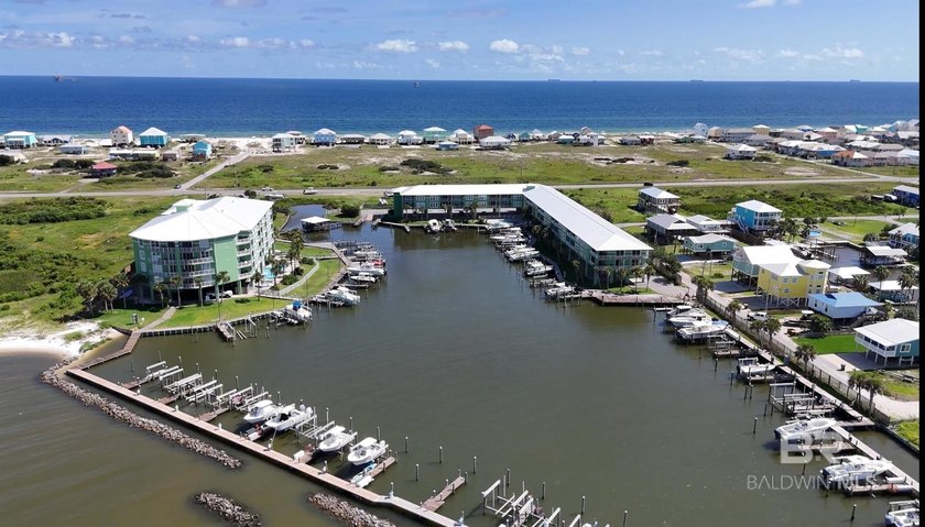 Fantastic bayfront condo with a deeded boat slip! Totally - Beach Condo for sale in Gulf Shores, Alabama on Beachhouse.com