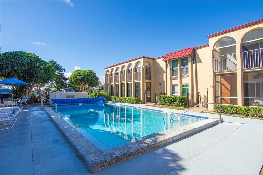 East of A1A, this stylishly move-in ready first floor end unit - Beach Condo for sale in Vero Beach, Florida on Beachhouse.com