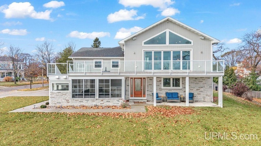 Originally built in 1962, this home underwent a complete - Beach Home for sale in Escanaba, Michigan on Beachhouse.com