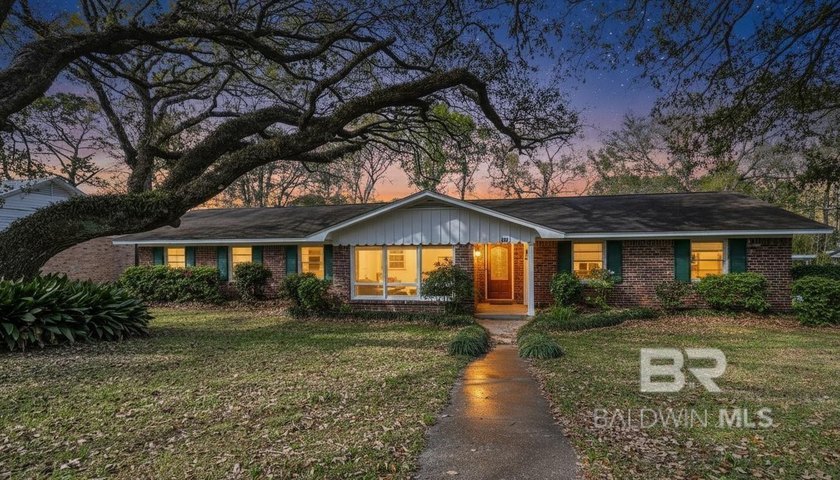 Charming one-level brick home featuring 3 bedrooms and 2 - Beach Home for sale in Daphne, Alabama on Beachhouse.com