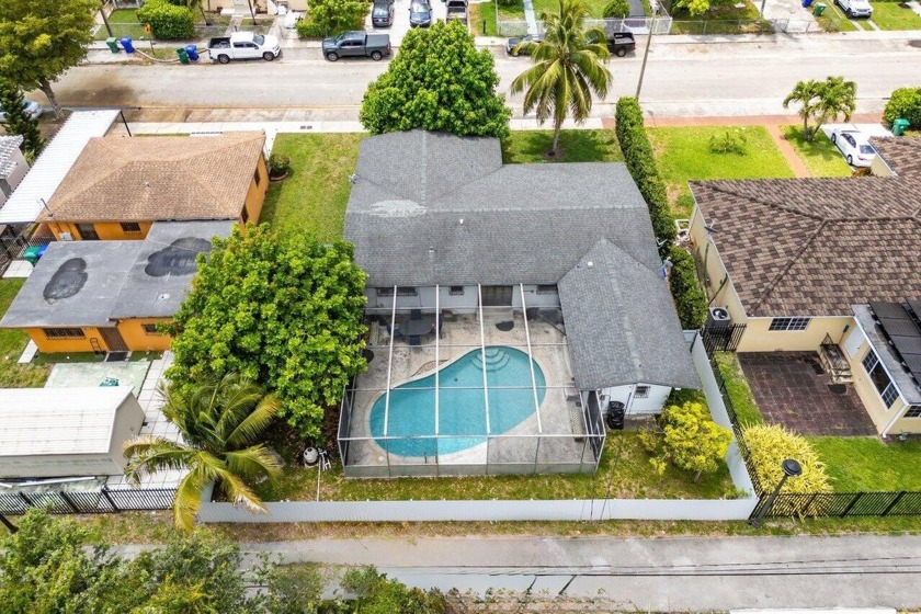 Welcome to the largest single-family lot in Crestwood! Enjoy - Beach Home for sale in Miami, Florida on Beachhouse.com