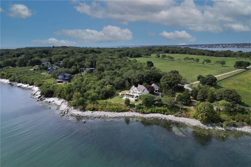 Waterfront retreat overlooking Mackerel Cove. Perched above the - Beach Home for sale in Jamestown, Rhode Island on Beachhouse.com