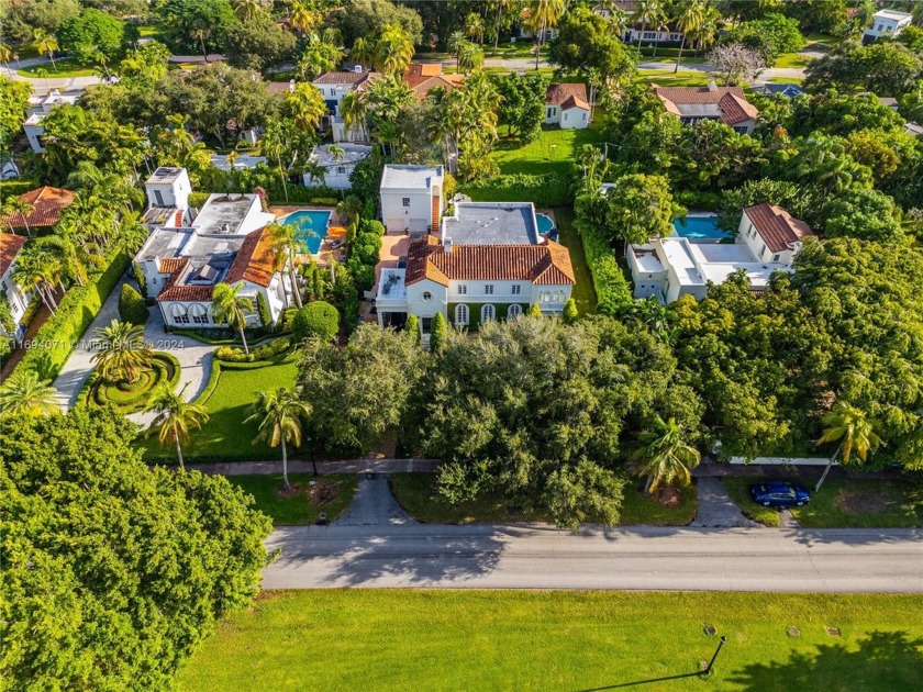 Overlooking the serene 2nd hole of the Granada Golf Course, this - Beach Home for sale in Coral Gables, Florida on Beachhouse.com