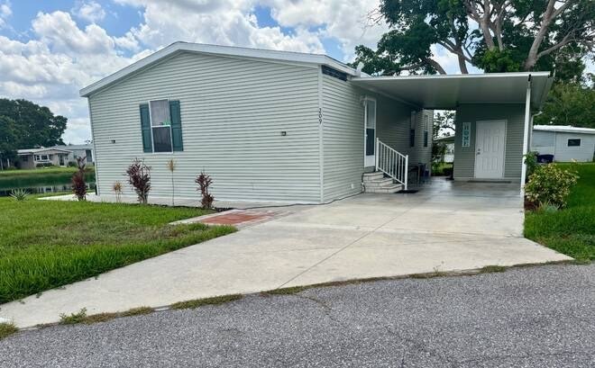 Stunning 3-Bedroom, 2-Bath Home with Lake View in Colony Cove - - Beach Home for sale in Ellenton, Florida on Beachhouse.com